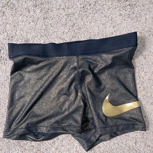 Black and Gold Nike Pro Spandex shorts